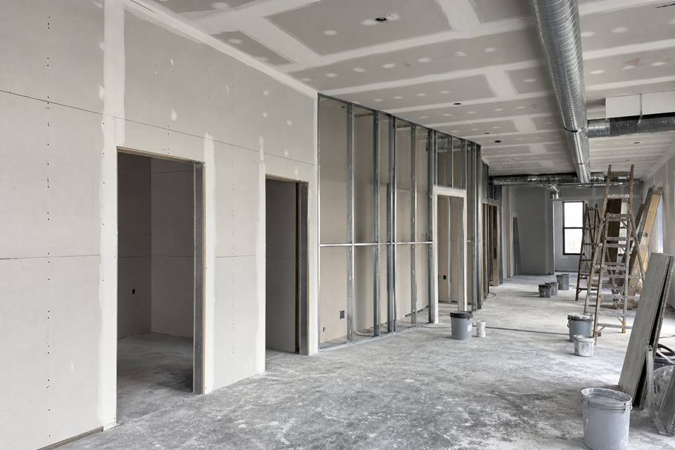 Commercial drywall buildout with metal studs and sheetrock for Daytona Beach drywall projects